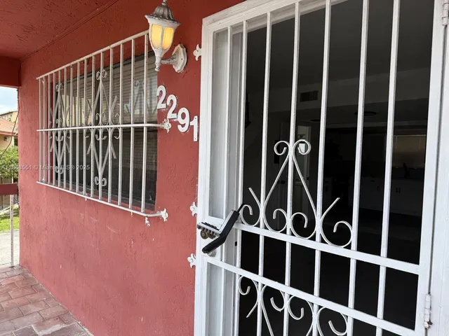 a view of a door with a street