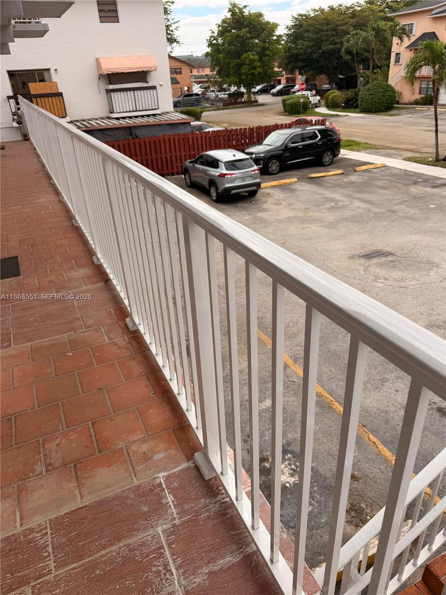 2291 West 53rd Place, Unit 2291 Hialeah, FL 33016 - Photo 2 of 11 a view of street from a balcony
