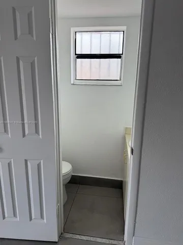 a bathroom with a toilet