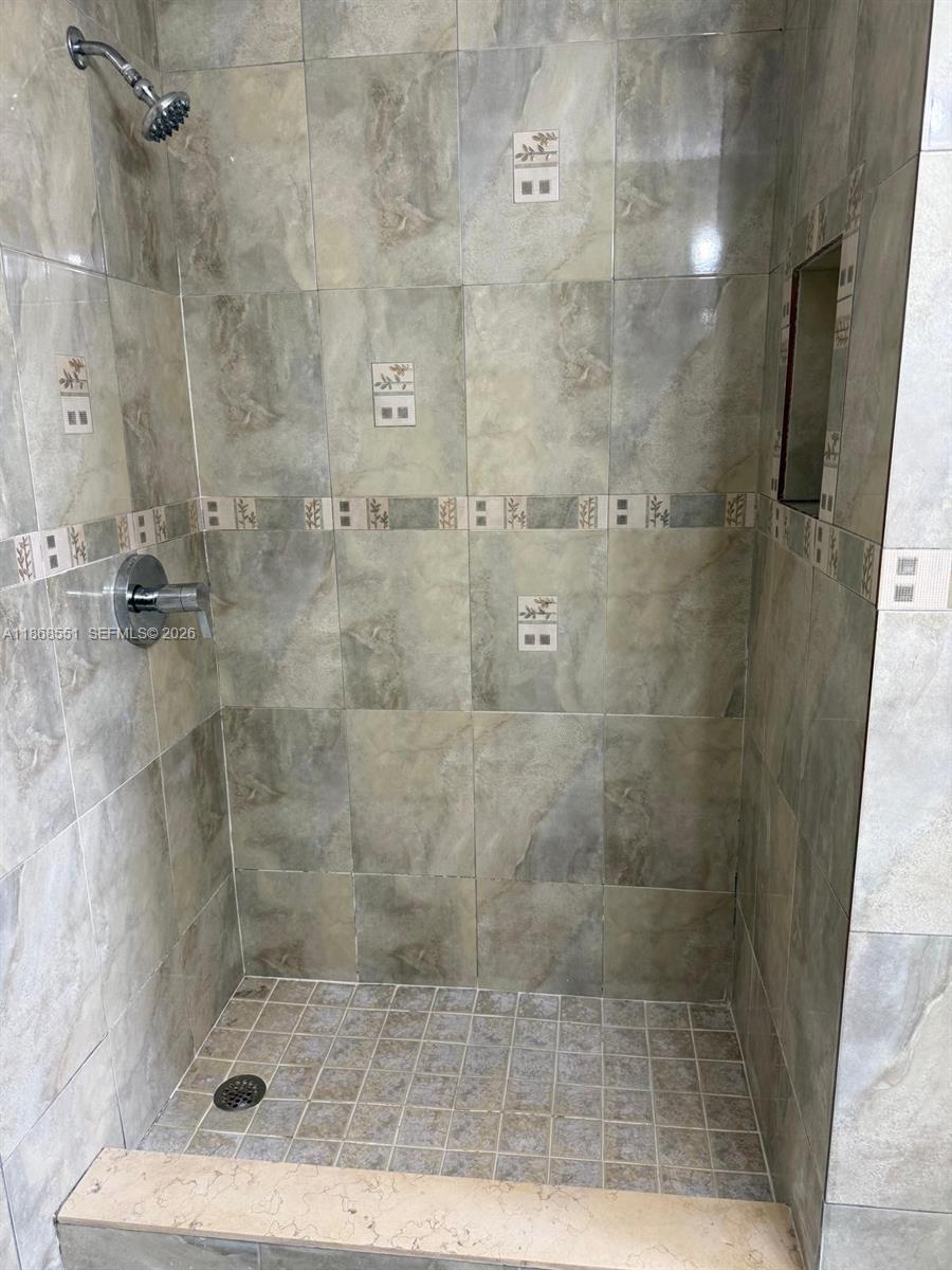 2291 West 53rd Place, Unit 2291 Hialeah, FL 33016 - Photo 10 of 11 a bathroom with a shower