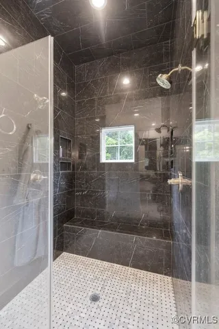 a view of a living room with clothes