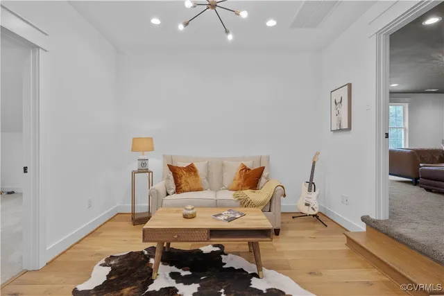 a room with gym equipment and a large window