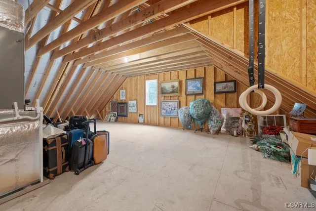 a view of a patio with table and chairs