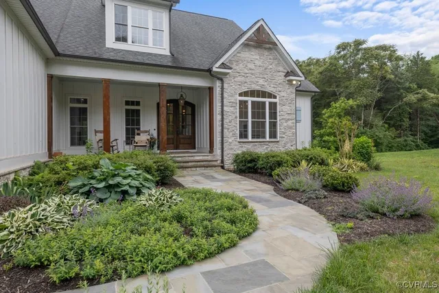 front view of a house with a yard