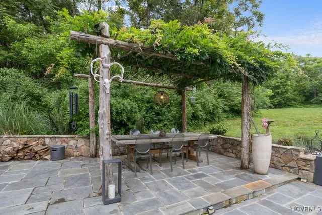 a view of a patio with furniture