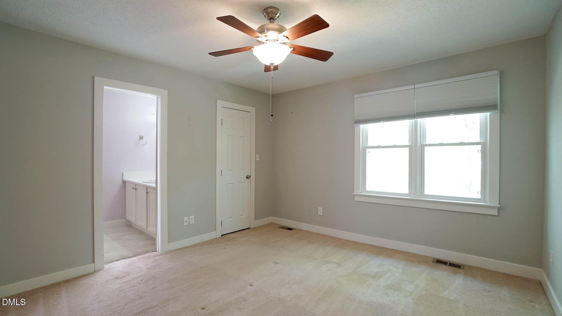 1427 Quarter Point Raleigh, NC 27615 - Photo 19 of 38 a view of an empty room with a window
