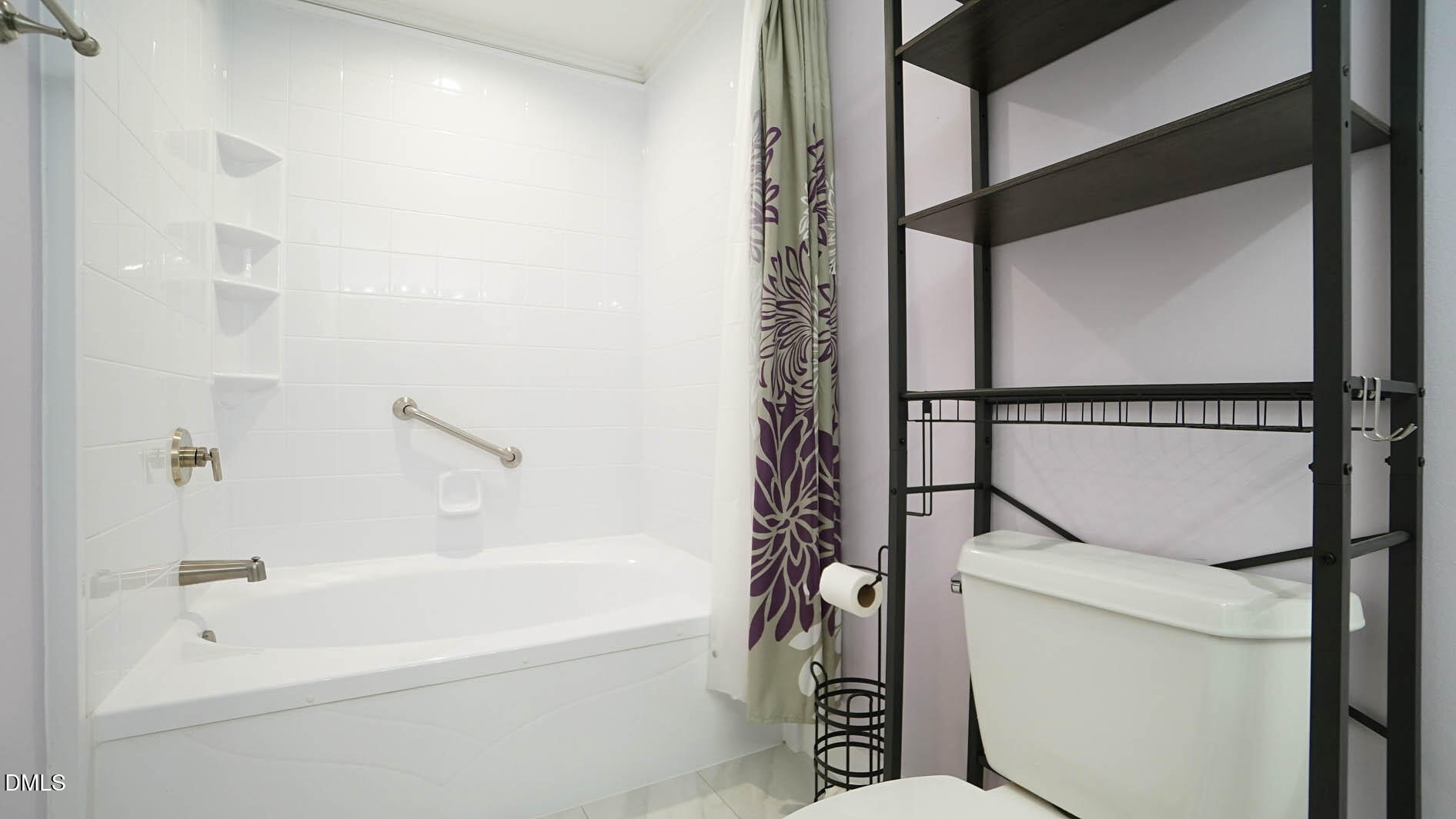 1427 Quarter Point Raleigh, NC 27615 - Photo 24 of 38 a bathroom with a tub and a shower