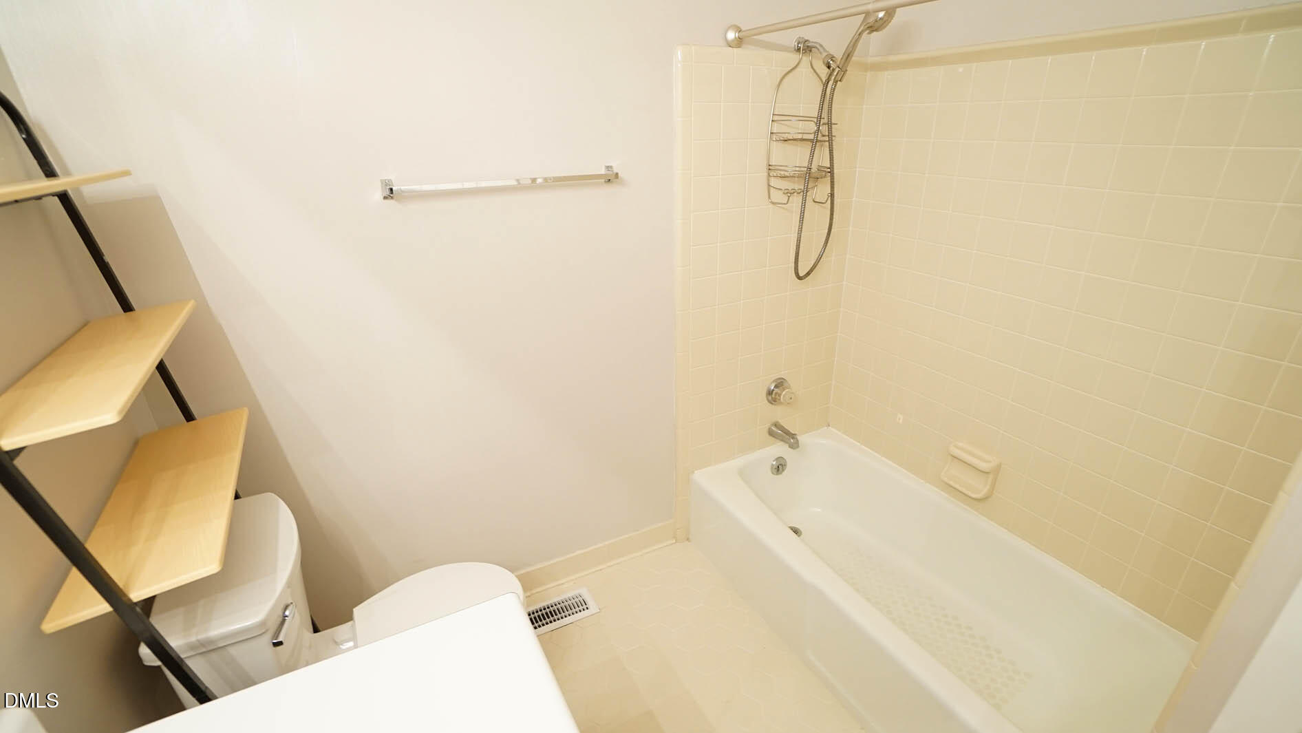 1427 Quarter Point Raleigh, NC 27615 - Photo 29 of 38 a bathroom with a bathtub and a shower