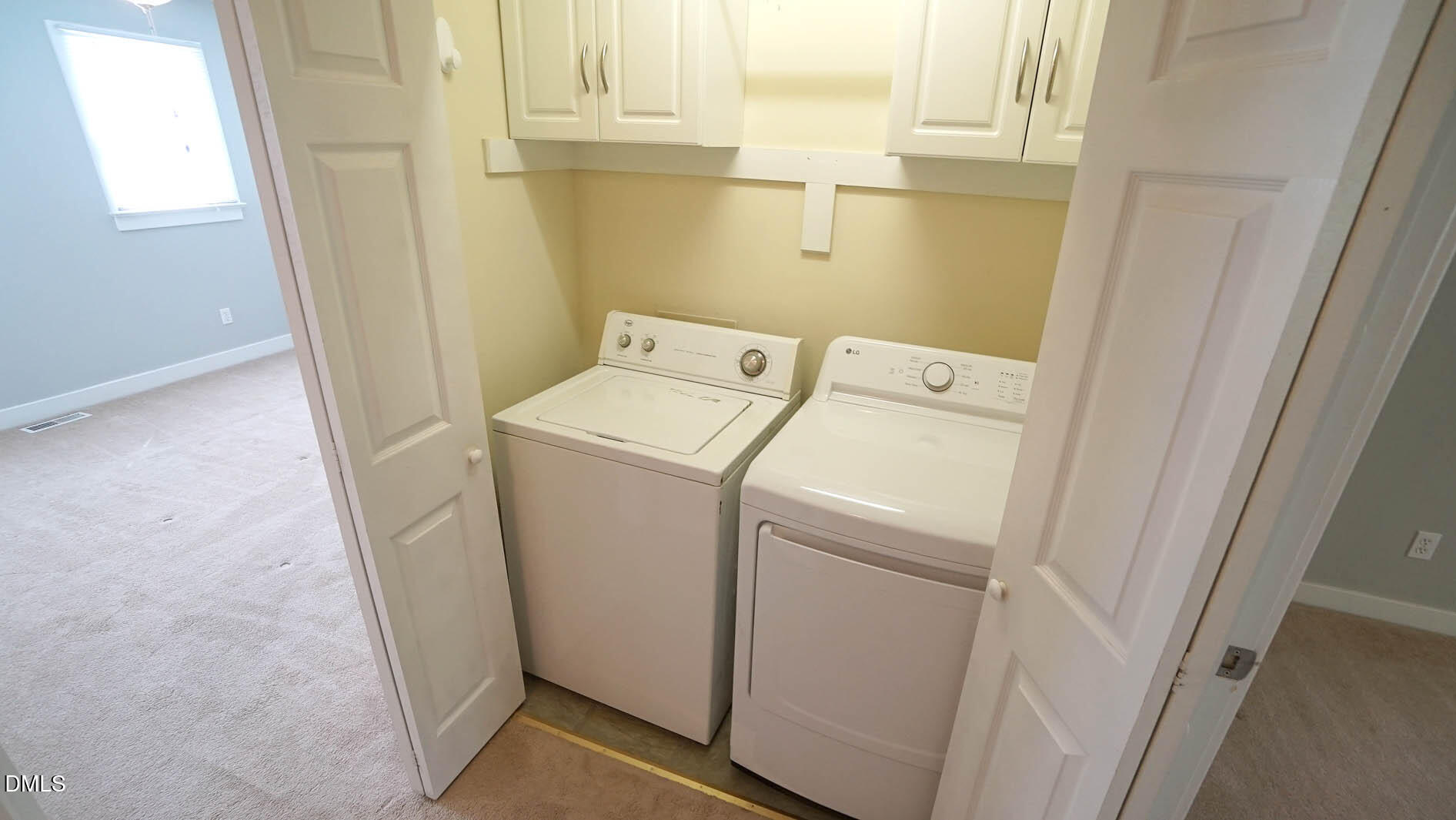 1427 Quarter Point Raleigh, NC 27615 - Photo 30 of 38 a utility room with dryer and washer