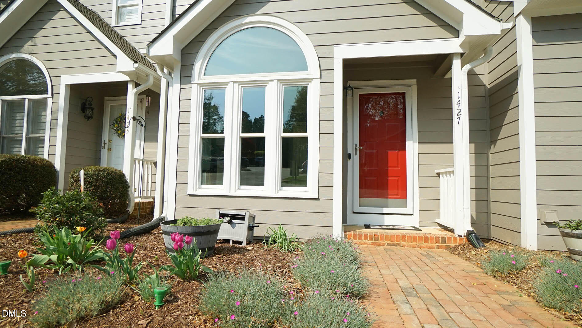 1427 Quarter Point Raleigh, NC 27615 - Photo 3 of 38 a house view with a outdoor space