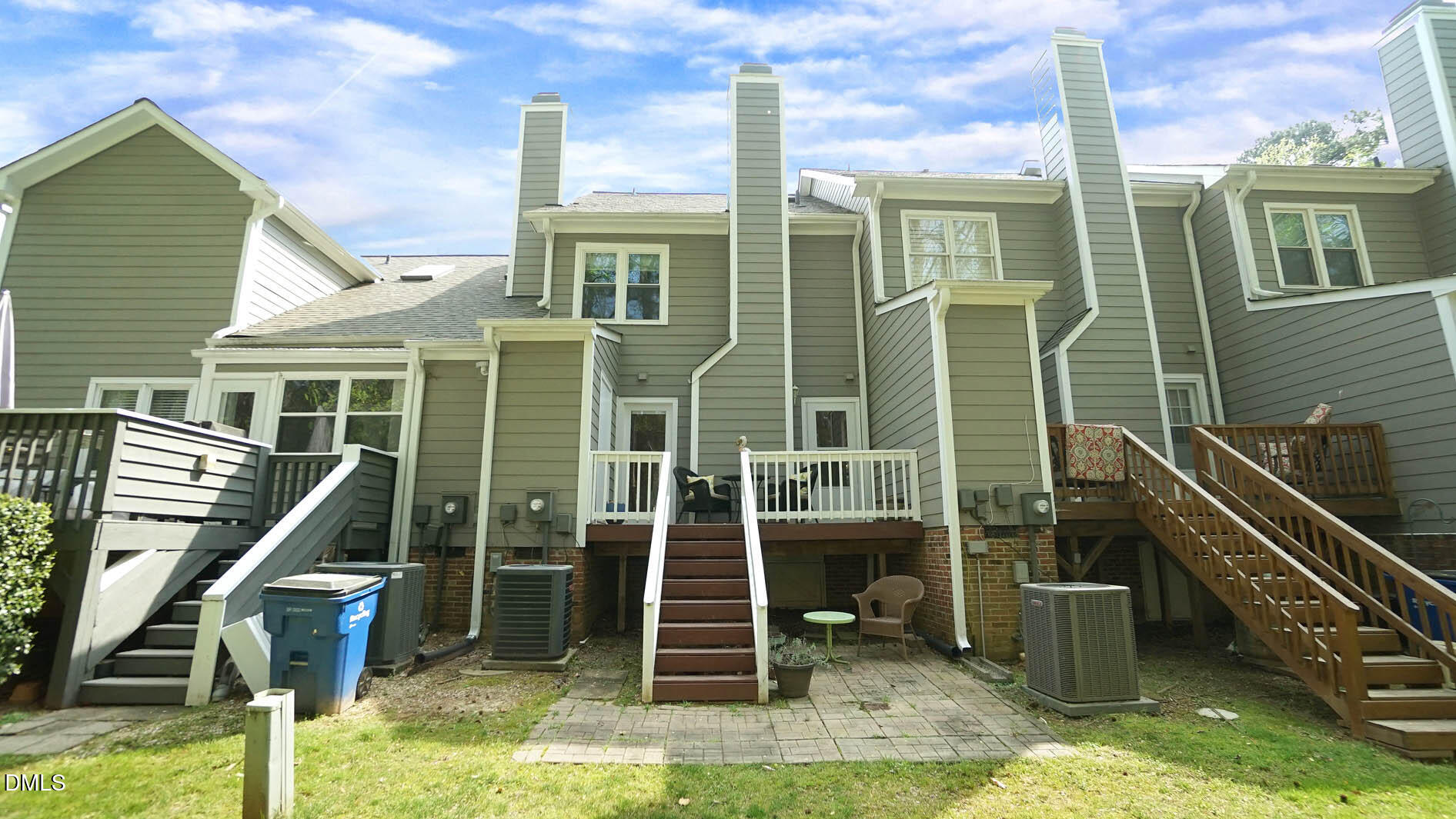 1427 Quarter Point Raleigh, NC 27615 - Photo 32 of 38 a front view of a house with a floor to ceiling windows
