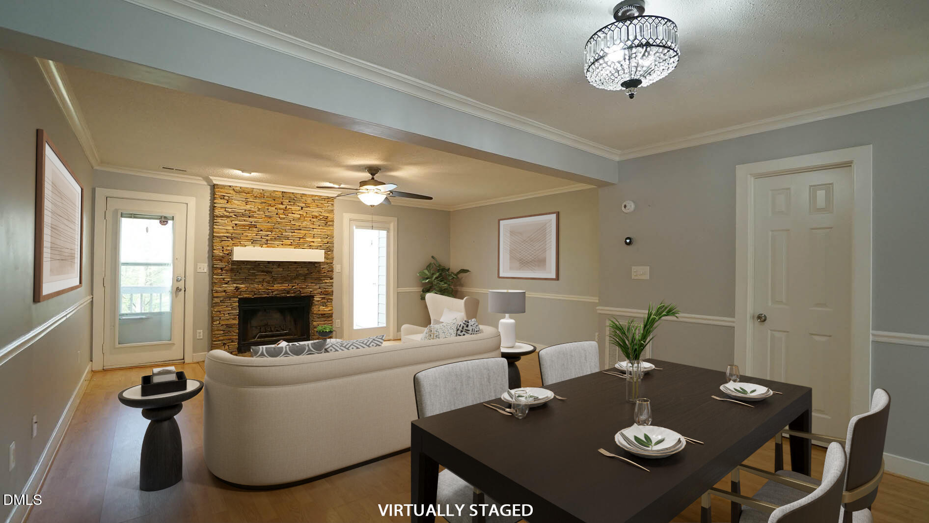 1427 Quarter Point Raleigh, NC 27615 - Photo 9 of 38 a living room with a couch dining table and a fireplace
