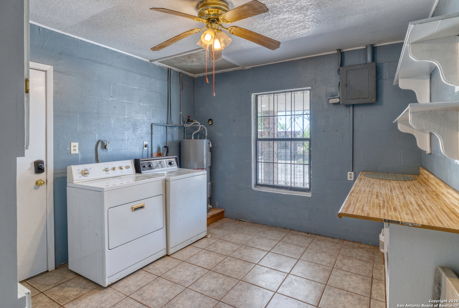 1390 Windmill Road Uvalde, TX 78801 - Photo 17 of 44 a room with storage and utility