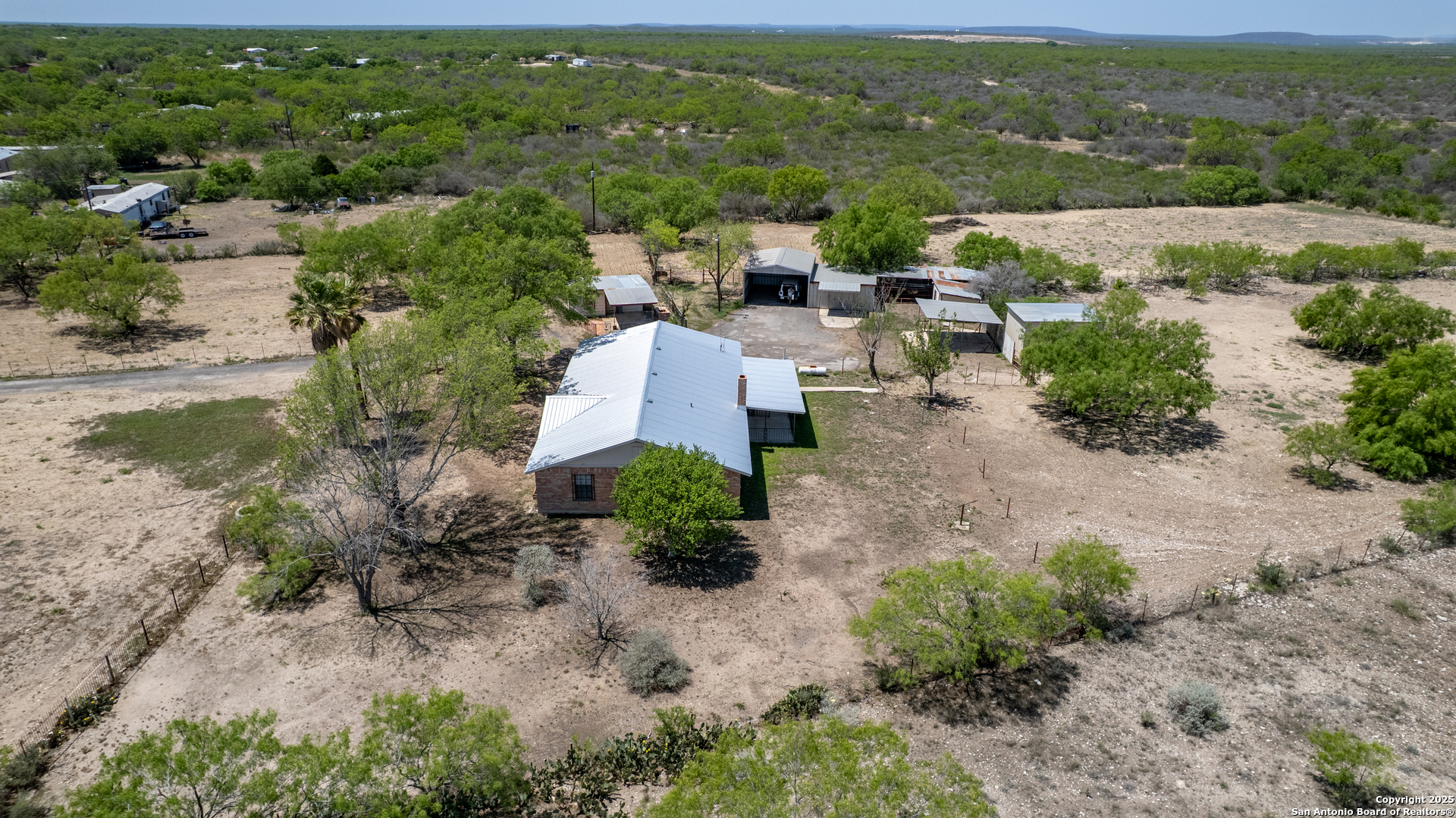 1390 Windmill Road Uvalde, TX 78801 - Photo 39 of 44 an aerial view of multiple house