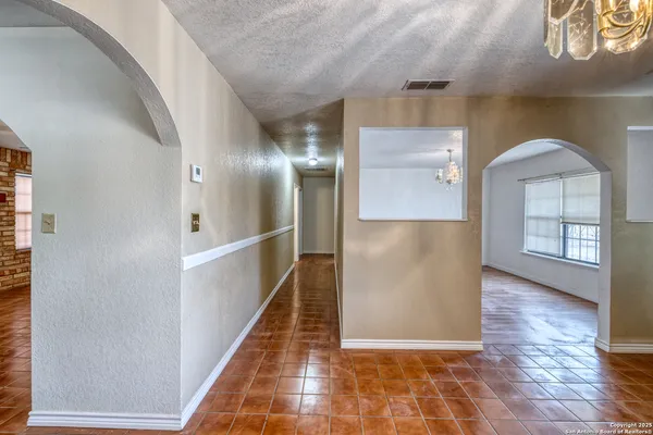 a view of a hallway with entryway