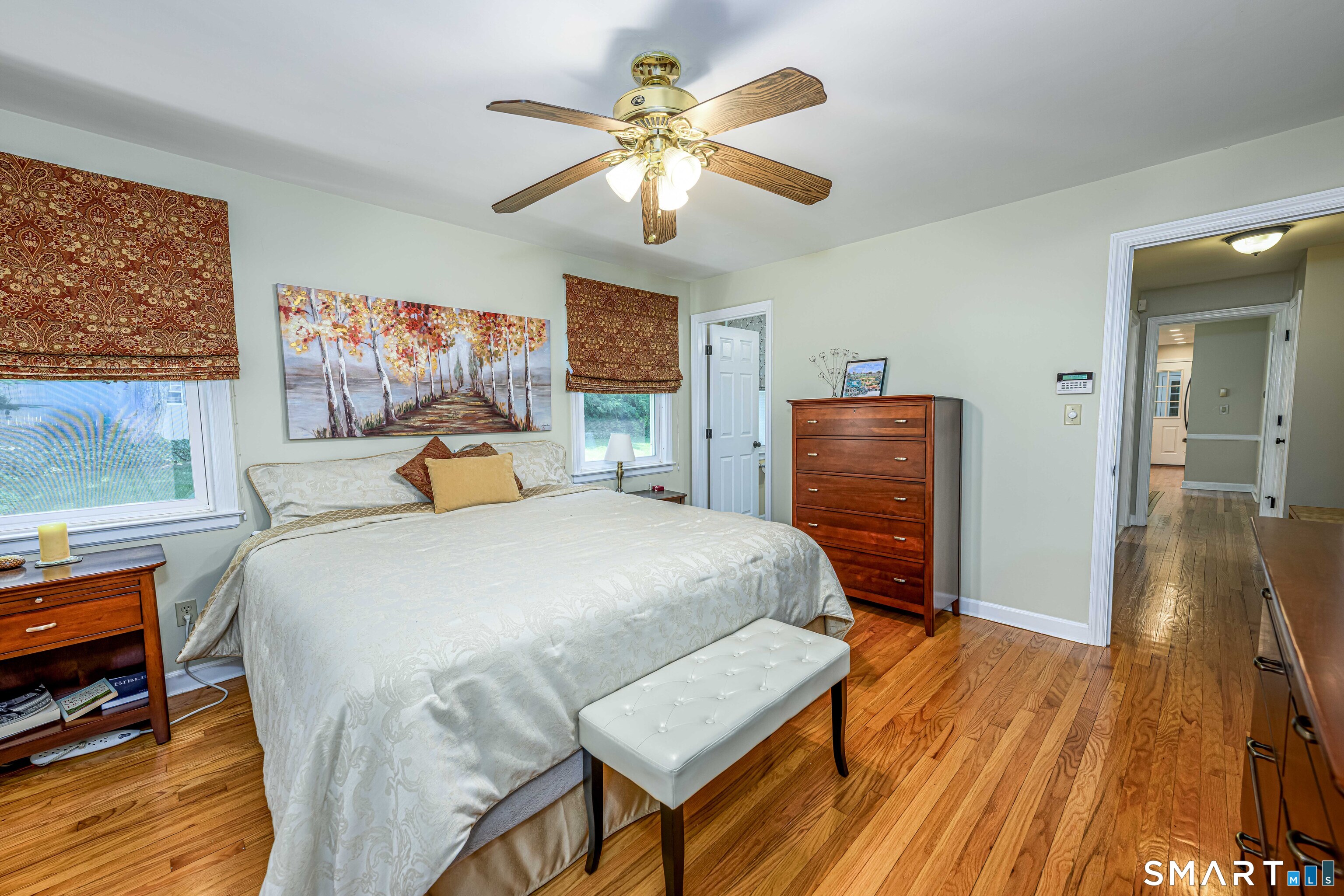 25 Wright Lane Hamden, CT 06517 - Photo 22 of 38 Primary bedroom with view into the hall, the door in the corner is the primary bath