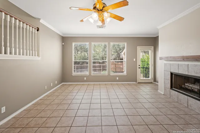 a kitchen with stainless steel appliances granite countertop a refrigerator and a stove