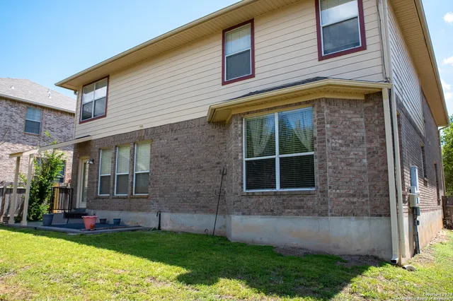 a view of a backyard with a slide