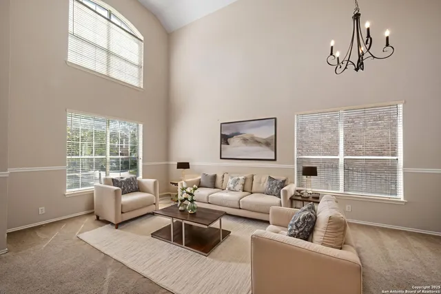 an empty room with a empty space and windows