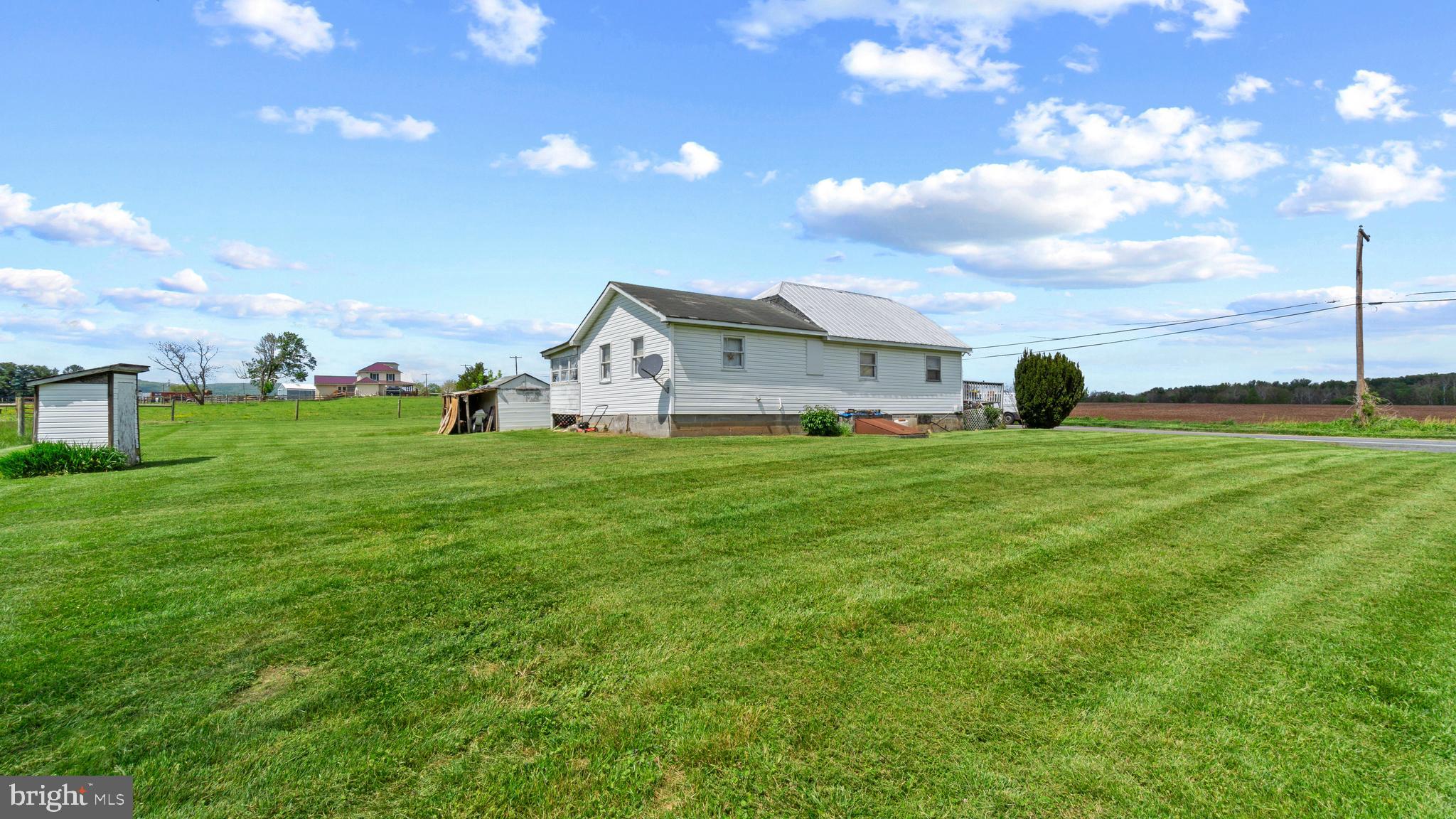 7549 Utica Road Thurmont, MD 21788 - Photo 4 of 5 a view of a house with a big yard