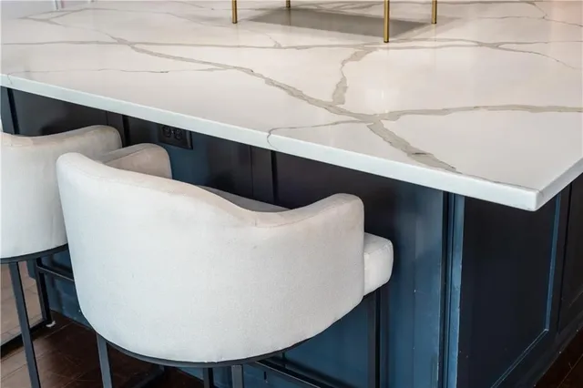 a living room with furniture a chandelier