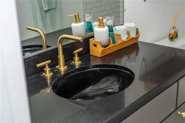 a view of a livingroom with furniture and a flat screen tv