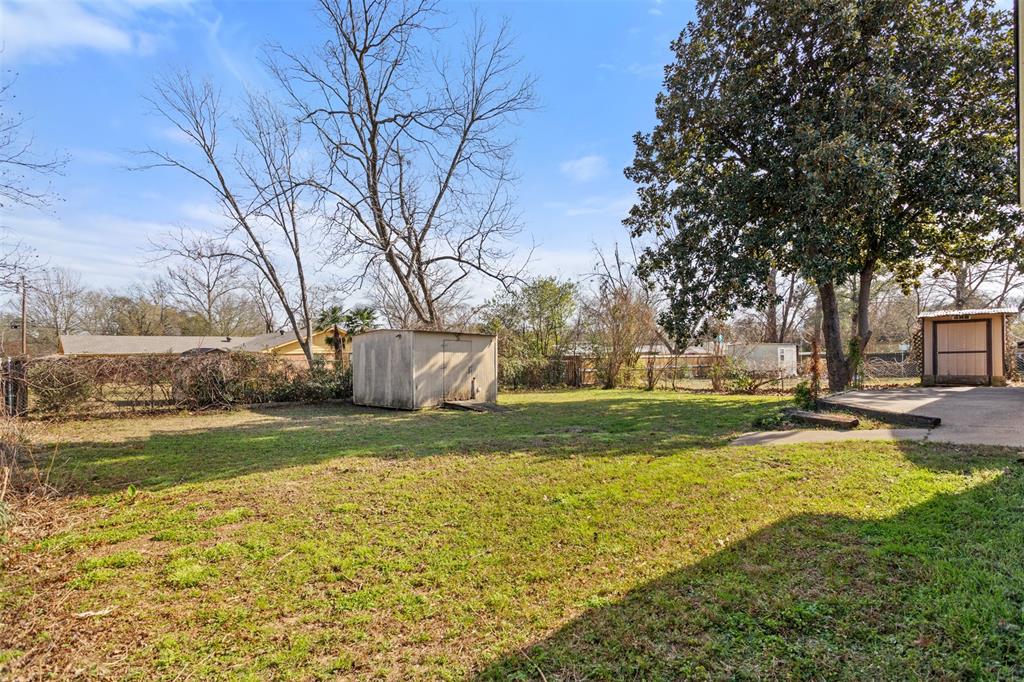 3126 Colgate Avenue Tyler, TX 75701 - Photo 31 of 33 a view of a yard with swimming pool