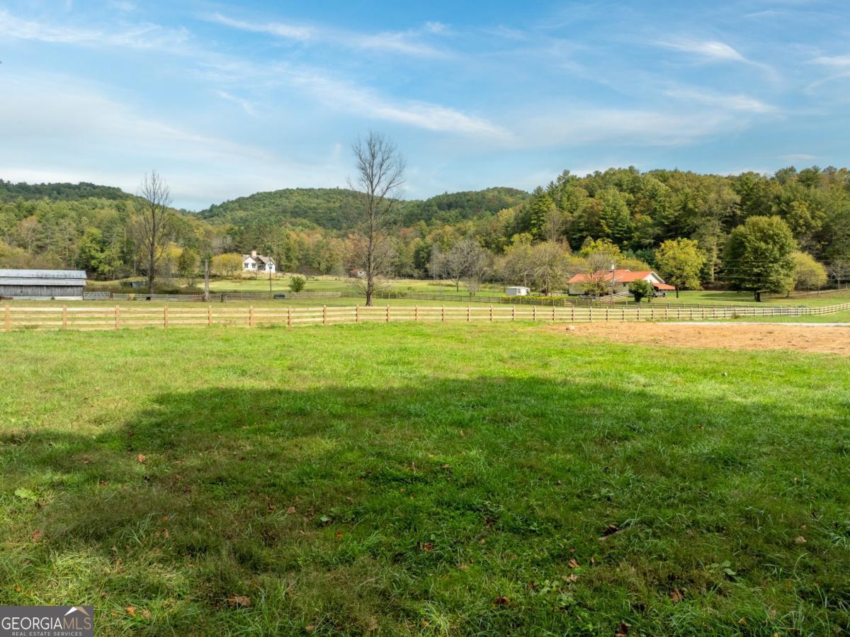 2673 Tails Creek Church Road Ellijay, GA 30540 - Photo 22 of 23 a view of an ocean and trees