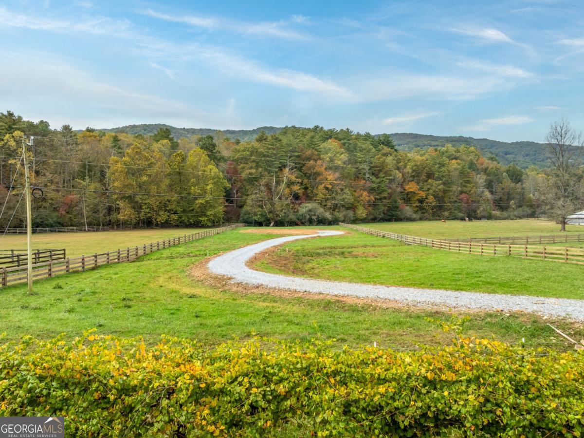 2673 Tails Creek Church Road Ellijay, GA 30540 - Photo 7 of 23 a view of a green field with clear sky
