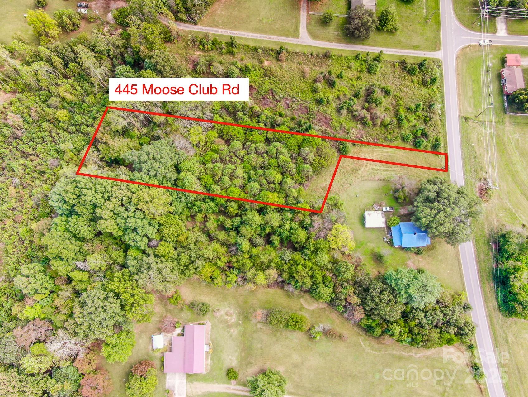 445 Moose Club Road Statesville, NC 28677 - Photo 2 of 6 a sign that is on a wooden wall