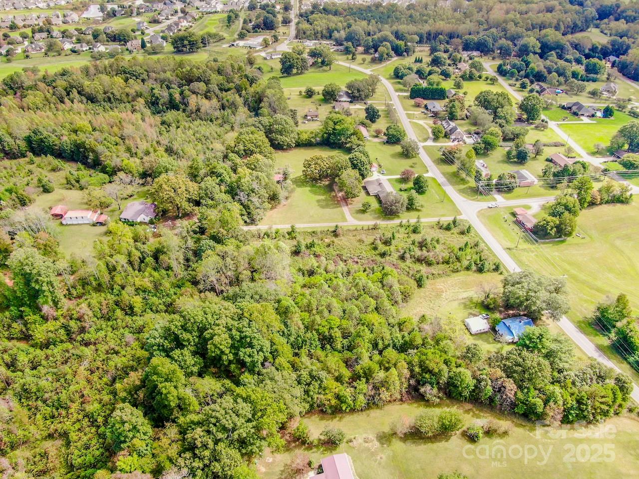 445 Moose Club Road Statesville, NC 28677 - Photo 5 of 6 a view of a green field