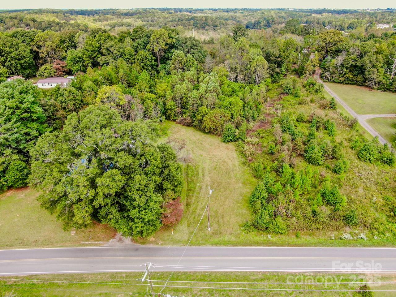 445 Moose Club Road Statesville, NC 28677 - Photo 6 of 6 a view of a yard with wooden floor and fence