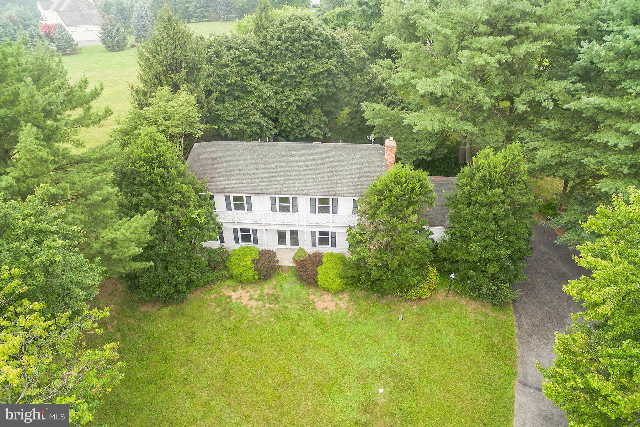 9448 Lovat Road Fulton, MD 20759 - Photo 2 of 30 an aerial view of a house with swimming pool