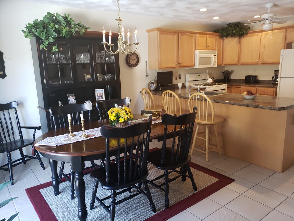 159 Allen Road, Unit 20 Billerica, MA 01821 - Photo 3 of 17 a view of a dining room with furniture