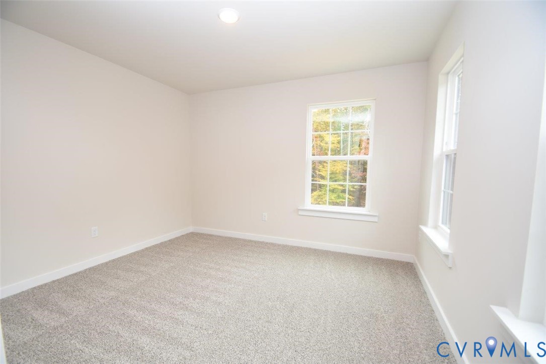 375 Amick Road Louisa, VA 23093 - Photo 16 of 25 an empty room with a window