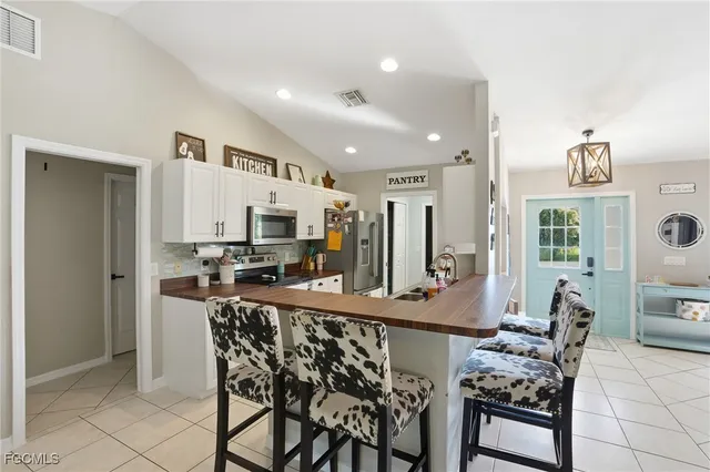 a view of a dining room with furniture