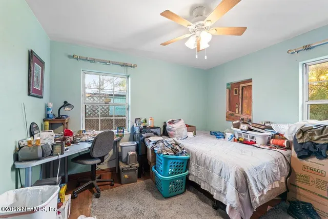 an aerial view of houses with yard