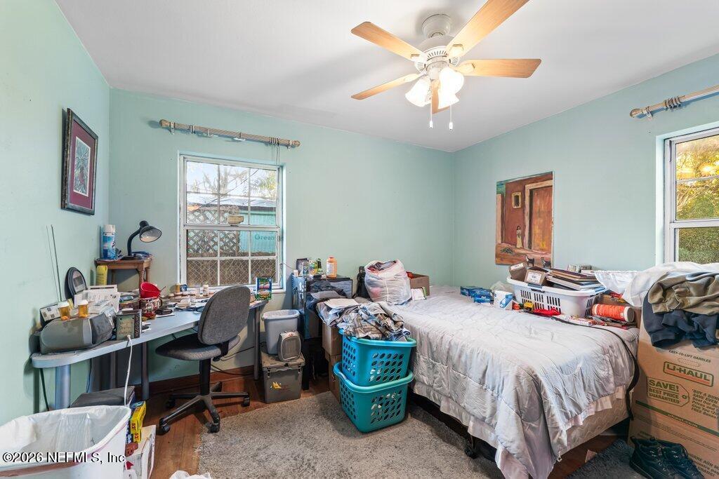 1226 Halifax Road Jacksonville, FL 32216 - Photo 17 of 27 a bedroom with 2 bed and a table