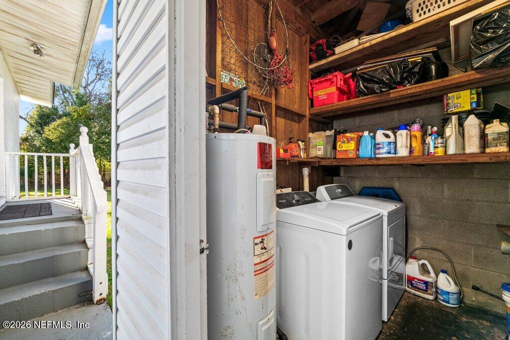 1226 Halifax Road Jacksonville, FL 32216 - Photo 19 of 27 a utility room with dryer and washer