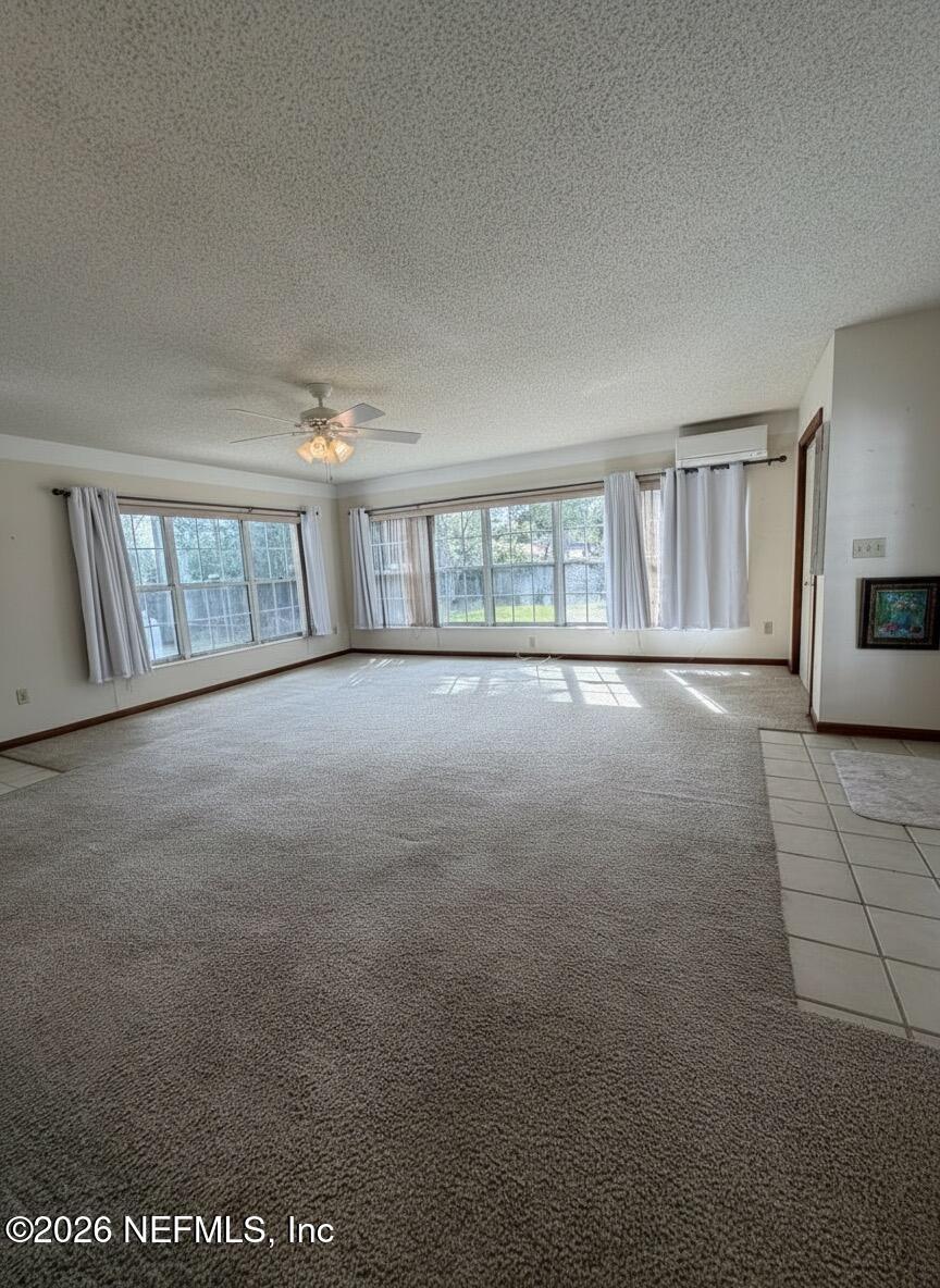 1226 Halifax Road Jacksonville, FL 32216 - Photo 5 of 29 a view of an empty room with a window