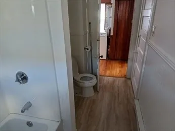 a bathroom with a sink and toilet