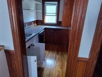 a view of balcony and wooden floor