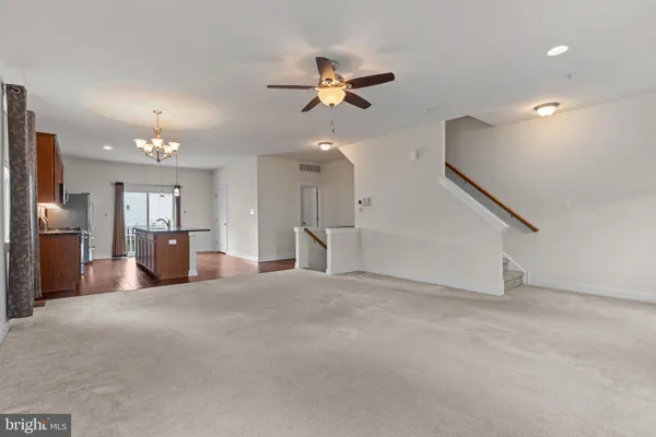 a view of a livingroom with a ceiling fan