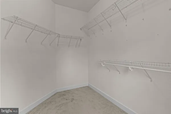 a view of a room with racks on the wall