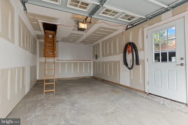 a view of a livingroom with a staircase