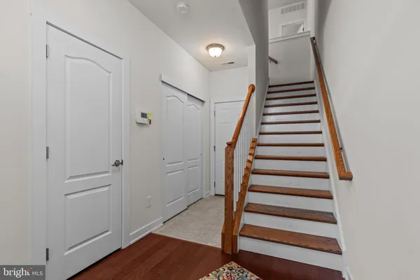 a view of entryway with wooden floor