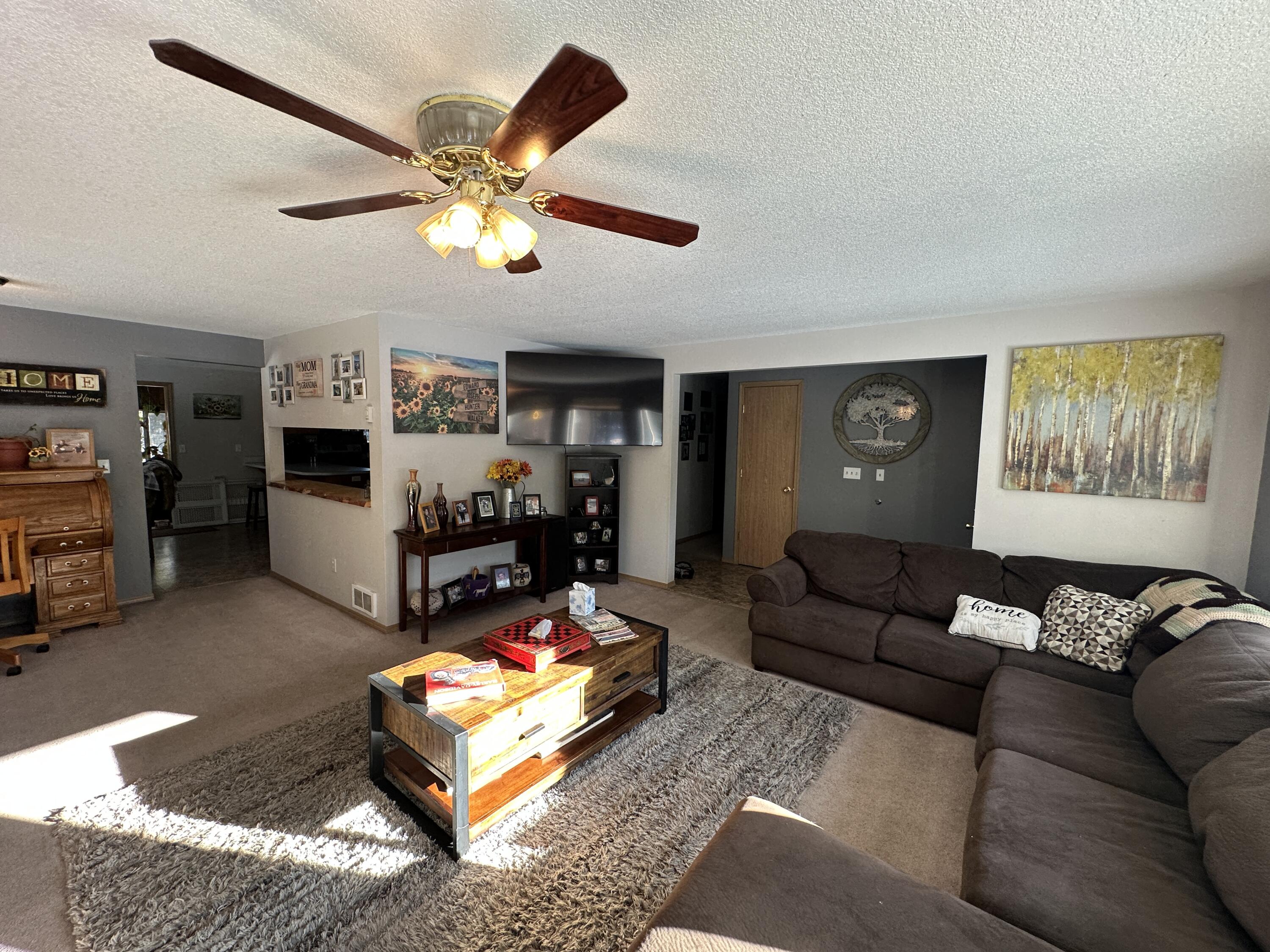 123977 Surveyor Road Crescent Lake, OR 97733 - Photo 16 of 41 a living room with furniture and a flat screen tv