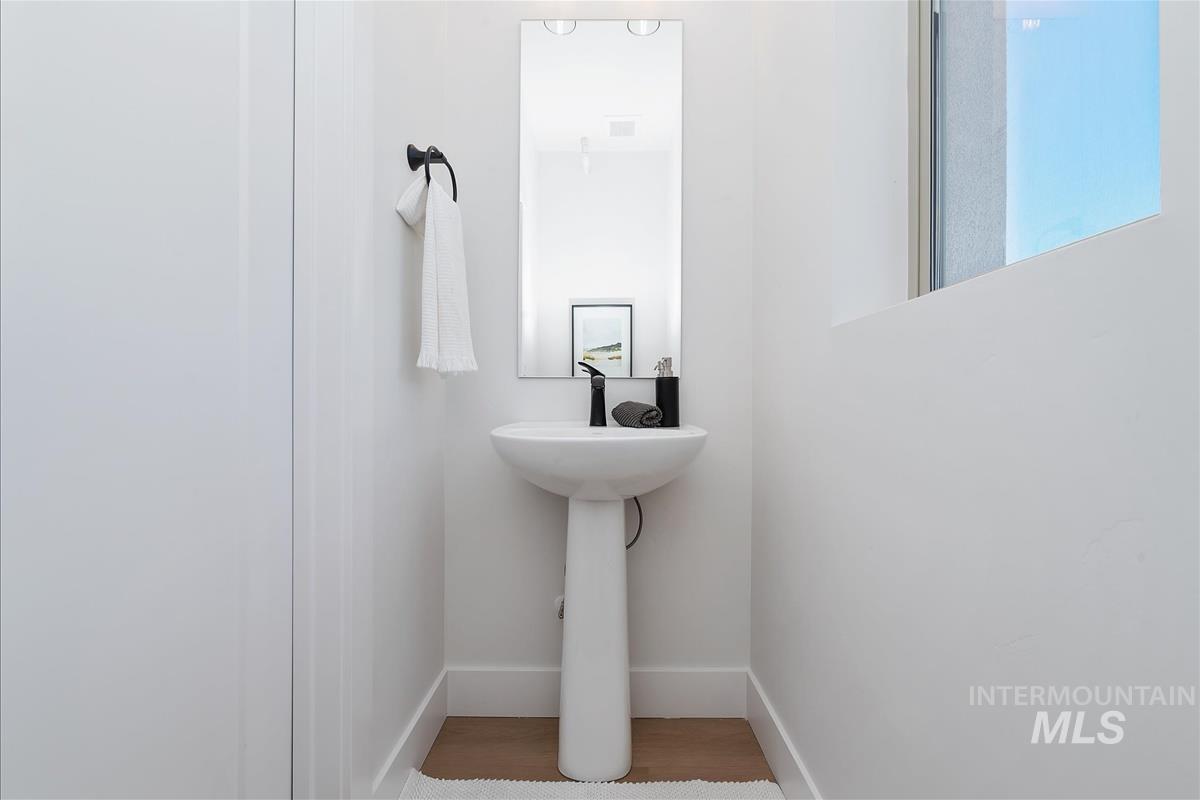 1703 South Federal Way Boise, ID 83705 - Photo 16 of 38 Bathroom featuring wood finished floors and baseboards