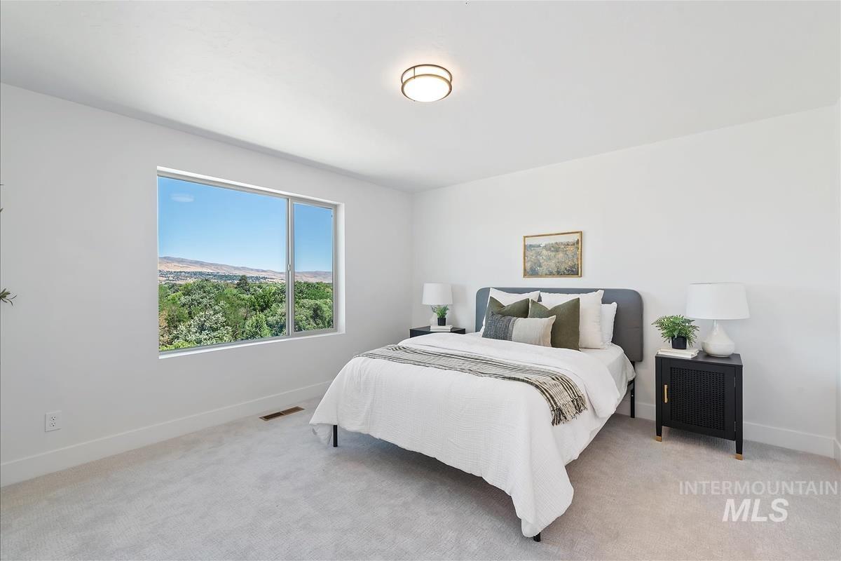 1703 South Federal Way Boise, ID 83705 - Photo 18 of 38 Carpeted bedroom with baseboards