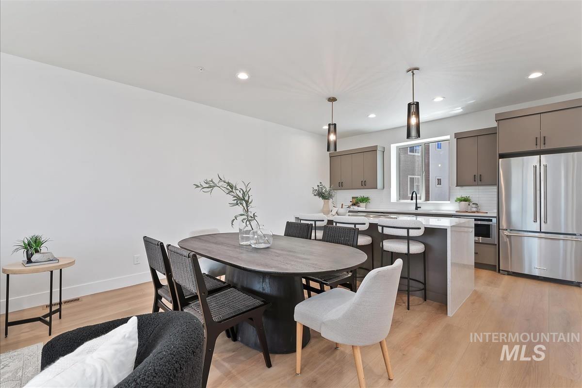 1703 South Federal Way Boise, ID 83705 - Photo 2 of 38 Dining room featuring light wood-style flooring and recessed lighting